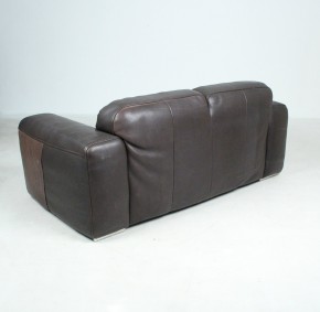 Two-seater sofa made of coarsely grained thick leather