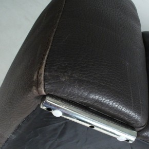 Two-seater sofa made of coarsely grained thick leather