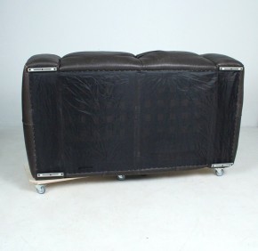 Two-seater sofa made of coarsely grained thick leather