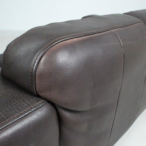 Two-seater sofa made of coarsely grained thick leather